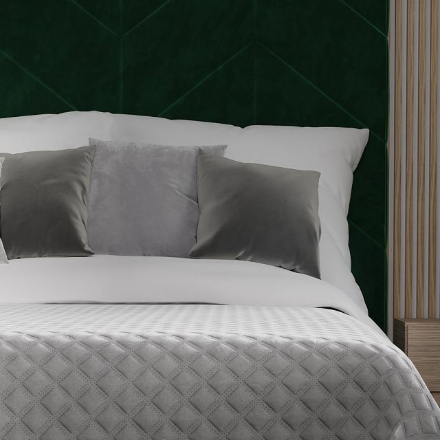 Maßgefertigte Kissenbezüge und gesteppte Tagesdecke als hochwertige Schlafzimmer-Textilien von M-Gardinendesign.