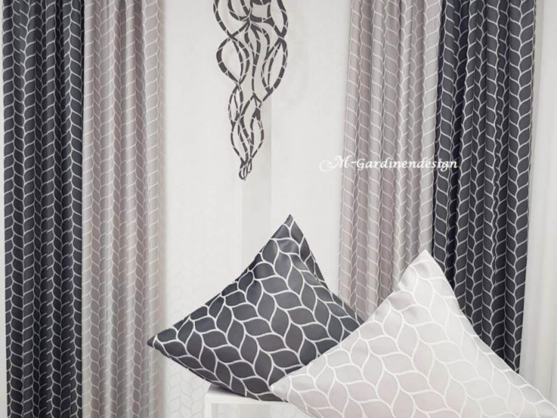 Maßgefertigte Kissenbezüge in Weiß und Grau als stilvolle Wohntextilien von M-Gardindendesign.
